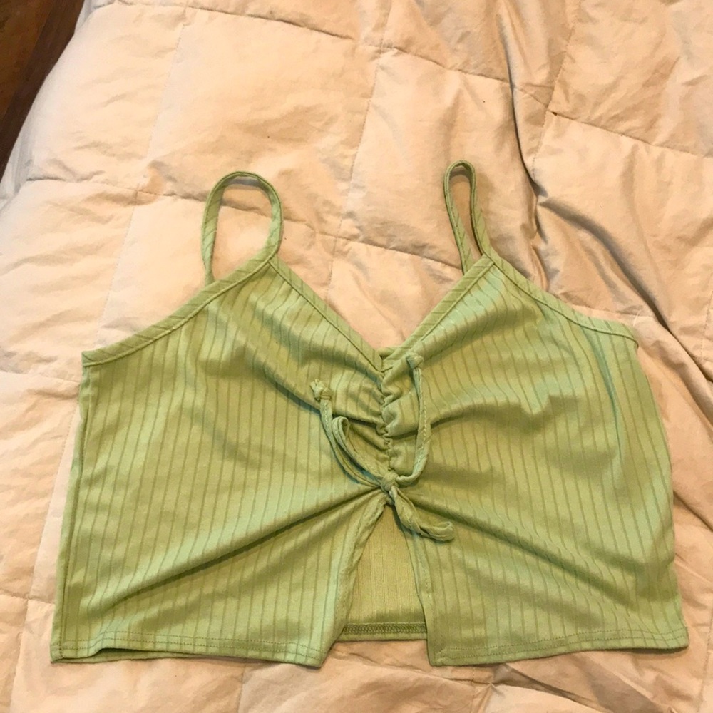 Cropped tank. Never been worn.